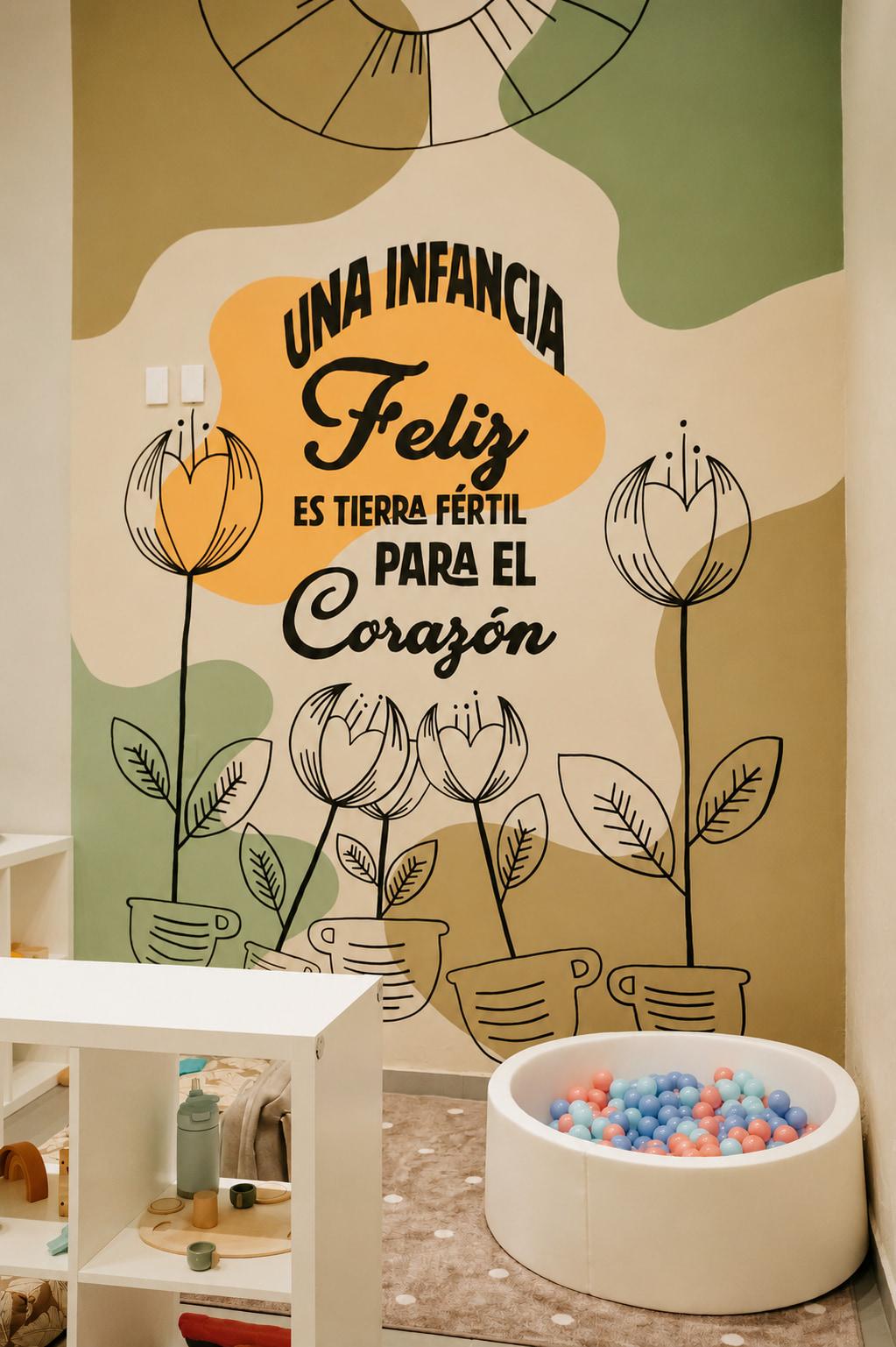 Detail of the 'Una infancia feliz' mural in the kids' nook